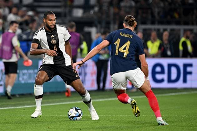 12.09.2023, xjhx, Fussball Länderspiel, Deutschland - Frankreich emspor, v.l. Jonathan Tah (Deutsche Fussball Nationalmannschaft DFB) Adrien Rabiot (Frankreich) Zweikampf, Aktion, action, battle for the ball (DFL DFB REGULATIONS PROHIBIT ANY USE OF PHOTOGRAPHS as IMAGE SEQUENCES and or QUASI-VIDEO) Dortmund