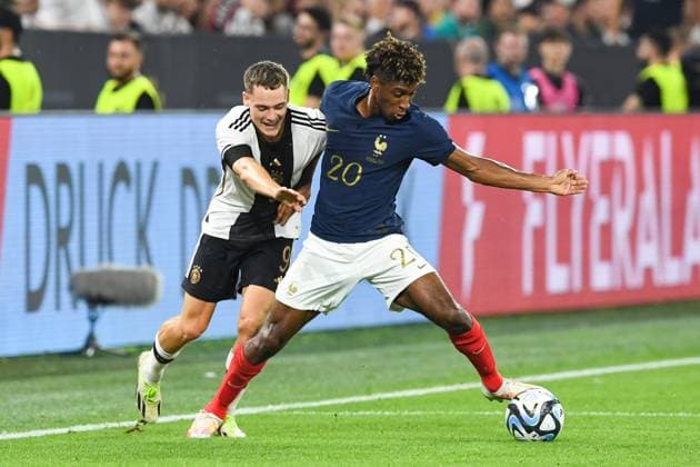 Fussball, Herren, Saison 2023 2024, Länderspiel in Dortmund, Deutschland - Frankreich, v. l. Florian Wirtz (Deutschland) und Kingsley Coman (Frankreich) im Zweikampf, battle for the ball, 12.09. 2023, Copyright: xSebastianxRäppold MatthiasxKochx