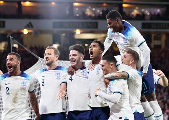 Scotland v England 150th Anniversary Heritage Match Jude Bellingham of England (middle) celebrates scoring his teams second goal with team mates during the 150th Anniversary Heritage Match match between Scotland and England at Hampden Park, Glasgow Copyright: xFredxPalmerx FIL-18948-0053 UK Newspapers OUT