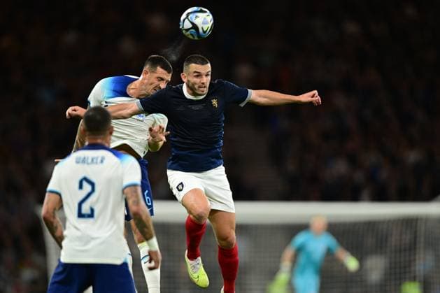 Scotland v England - 150th Anniversary Heritage Match Lewis Dunk of England and John McGinn of Scotland challenge during the 150th Anniversary Heritage Match between Scotland and England at Hampden Park on September 12, 2023 in Glasgow Scotland. Glasgow Hampden Park Glasgow Scotland Copyright: xGreigxCowie Sportsphoto APLx 13954344
