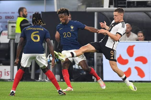 Fussball, Herren, Saison 2023 2024, Länderspiel in Dortmund, Deutschland - Frankreich, v. l. Kingsley Coman (Frankreich) und Florian Wirtz (Deutschland) im Zweikampf, battle for the ball, 12.09. 2023, Copyright: xSebastianxRäppold MatthiasxKochx