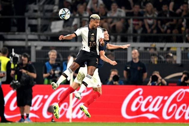 DORTMUND - (l-r) Serge Gnabry of Germany, Benjamin Pavard of France during the friendly Interland match between Germany and France at the Signal Iduna Park on September 12, 2023 in Dortmund, Germany. ANP Hollandse Hoogte International Friendly, Länderspiel, Nationalmannschaft 2023 2024 xVIxANPxSportx xGerritxvanxKeulenxIVx 478048990 originalFilename: 478048990.jpg