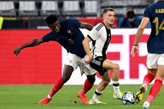 DORTMUND - (l-r) Aurelien Tchouameni of France, Florian Wirtz of Germany during the friendly Interland match between Germany and France at the Signal Iduna Park on September 12, 2023 in Dortmund, Germany. ANP Hollandse Hoogte International Friendly, Länderspiel, Nationalmannschaft 2023 2024 xVIxANPxSportx xGerritxvanxKeulenxIVx 478050472 originalFilename: 478050472.jpg