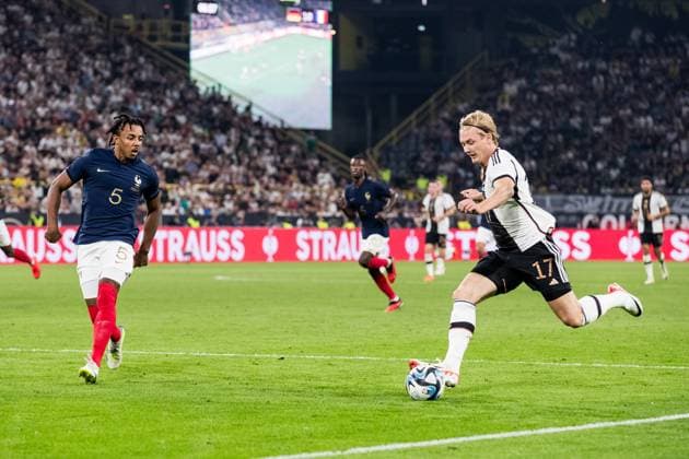 Freundschaftsspiel Deutschland - Frankreich; 12.09.2023 Jules Kounde (Frankreich, 05), Julian Brandt (Deutschland, 17) Freundschaftsspiel Deutschland - Frankreich, Dortmund, Signal Iduna Park am 12.09.2023 DFB REGULATIONS PROHIBIT ANY USE OF PHOTOGRAPHS AS IMAGE SEQUENCES AND OR QUASI-VIDEO. Copyright: xBEAUTIFULxSPORTS Wunderlx