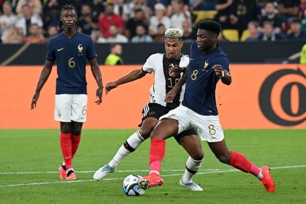 (230913) -- DORTMUND, Sept. 13, 2023 -- Serge Gnabry (L, front) of Germany vies with Aurelien Tchouameni of France during a friendly match between Germany and France in Dortmund, Germany, Sept. 12, 2023. (Photo by Xinhua) (SP)GERMANY-DORTMUND-FOOTBALL-FRIENDLY MATCH-GERMANY VS FRANCE UlrichxHufnagel 