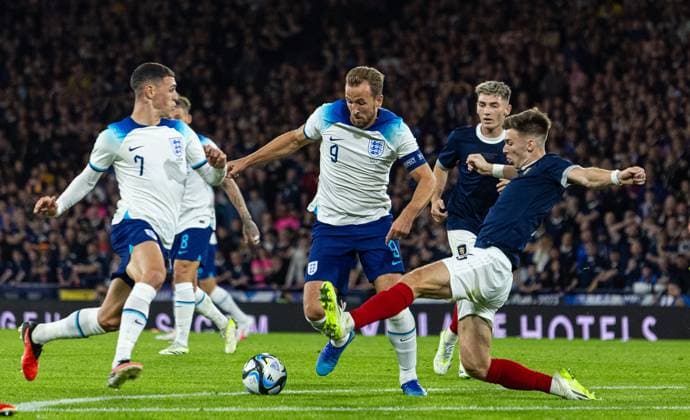 (230913) -- GLASGOW, Sept. 13, 2023 -- England s Harry Kane (C) vies for the ball during a friendly match between Scotland and England in Glasgow, Britain, on Sept. 12, 2023. (SP)BRITAIN-GLASGOW-FOOTBALL-FRIENDLY MATCH-SCOTLAND VS ENGLAND str 