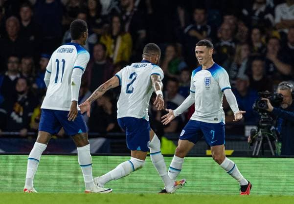 (230913) -- GLASGOW, Sept. 13, 2023 -- England s Phil Foden (R) celebrates with teammate Kyle Walker after scoring the opening goal during a friendly match between Scotland and England in Glasgow, Britain, on Sept. 12, 2023. (SP)BRITAIN-GLASGOW-FOOTBALL-FRIENDLY MATCH-SCOTLAND VS ENGLAND str 