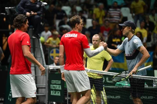 Foto Massimo Paolone LaPresse 14 Settembre 2023 - Bologna, Italia - tennis - Canada vs Svezia - Vasek Pospisil (CAN) v Leo Borg (SWE) - Coppa Davis 2023 - Unipol Arena. Nella foto: Vasek Pospisil e Leo Borg a fine partita September 14, 2023 Bologna, Italy - sport, tennis - Canada vs Sweden - Vasek Pospisil (CAN) v Leo Borg (SWE) - Davis Cup 2023 - Unipol Arena. In the pic: Vasek Pospisil and Leo Borg at the end of the match  Copyright: xMassimoxPaolone LaPressex