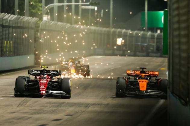 24 Guanyu Zhou (CHN, Alfa Romeo F1 Team Stake), 81 Oscar Piastri (AUS, McLaren F1 Team), F1 Grand Prix of Singapore at Marina Bay Street Circuit on September 15, 2023 in Singapore, Singapore. (Photo by HOCH ZWEI) Singapore Singapore