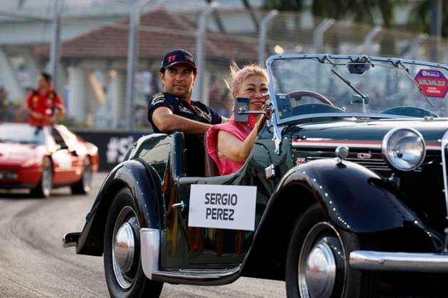 17th September 2023; Marina Bay Street Circuit, Singapore; 2023 Formula 1 Singapore Airlines Singapore Grand Prix; Race Day; Number 11 Red Bull driver Sergio Perez during the drivers parade  ActionPlus12554709 StephenxBlackberry
