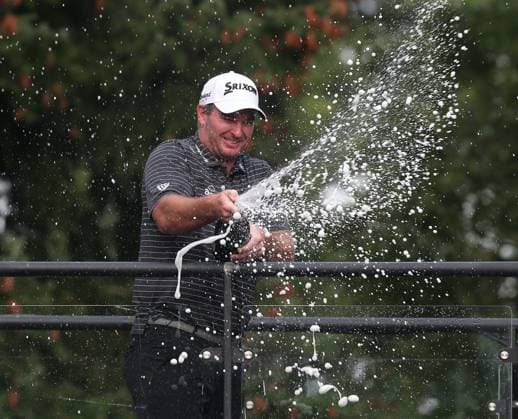 BMW PGA, Golf Herren Championship, Round 4, DP World Tour, European Tour, Wentworth Golf Club, Surrey, UK. - 17th September 2023. Ryan Fox of New Zealand celebrates spraying champagne after winning The 2023 BMW PGA Championship with a score of -18 Par. - BMW PGA Championship, Round 4, DP World Tour, European Tour, Wentworth Golf Club, Surrey, UK. - 17th September 2023. Surrey Wentworth Golf Course United Kingdom Copyright: xDanxWeirx CP_BMW_PGA_Championship_Round_4_71