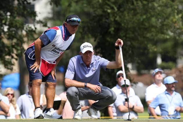 COLLEGE GROVE, TN - SEPTEMBER 17: Carter Jenkins and his caddie line up a putt on the No. 13 green during the final round of the Korn Ferry Tour Finals Simmons Bank Open, September 17, 2023 at The Grove in College Grove, Tennessee. (Photo by Matthew Maxey Icon Sportswire) GOLF: SEP 17 Simmons Bank Open EDITORIAL USE ONLY Icon23091725