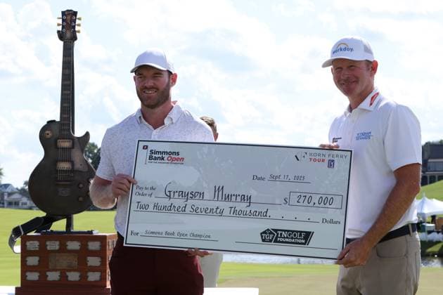 COLLEGE GROVE, TN - SEPTEMBER 17: Grayson Murray is presented a check from 2012 FedEx Cup Champion and tournament host Brandt Sneaker following the final round of the Korn Ferry Tour Finals Simmons Bank Open, September 17, 2023 at The Grove in College Grove, Tennessee. (Photo by Matthew Maxey Icon Sportswire) GOLF: SEP 17 Simmons Bank Open EDITORIAL USE ONLY Icon23091739