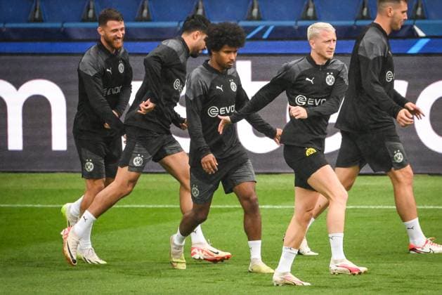 September 18, 2023, Paris, France, France: Salih OZCAN of Borussia Dortmund, Karim ADEYEMI of Borussia Dortmund and Marco REUS of Borussia Dortmund during a Borussia Dortmund training session at Parc des Princes Stadium on September 18, 2023 in Paris, France. Paris France - ZUMAm308 20230918_zsp_m308_033 Copyright: xMatthieuxMirvillex