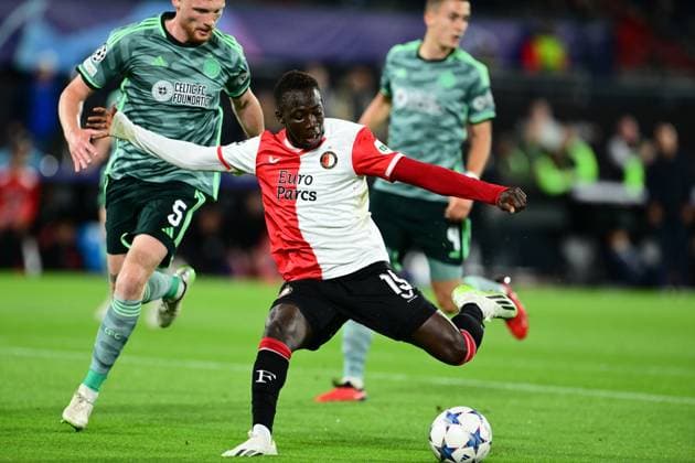 ROTTERDAM - (l-r) Liam Scales of Celtic, Yankuba Minteh of Feyenoord during the UEFA Champions League match between Feyenoord and Celtic FC at Feyenoord Stadion de Kuip on September 19, 2023 in Rotterdam, Netherlands. ANP OLAF KRAAK Group E - UEFA Champions League 2023 2024 xVIxANPxSportx xxANPxIVx 478714784 originalFilename: 478714784.jpg