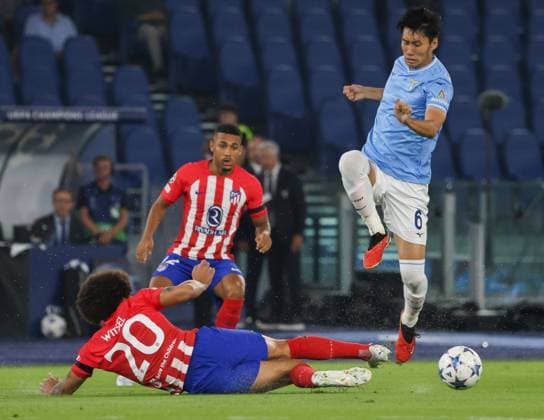 football match for the Champions League 2023 24 between Lazio vs Atletico Madrid 19 09 2023 Rome Olympic stadium football match valid for the Champions League 2023 24 between SS Lazio vs Atletico Madrid In the picture: Daichi Kamada of SS Lazio - Axel Witsel (Atletico de Madrid) Rome Olympic Stadium Lazio Italy Copyright: xFABIOxSASSOxFABIOxSASSOx 2L8A0818-2