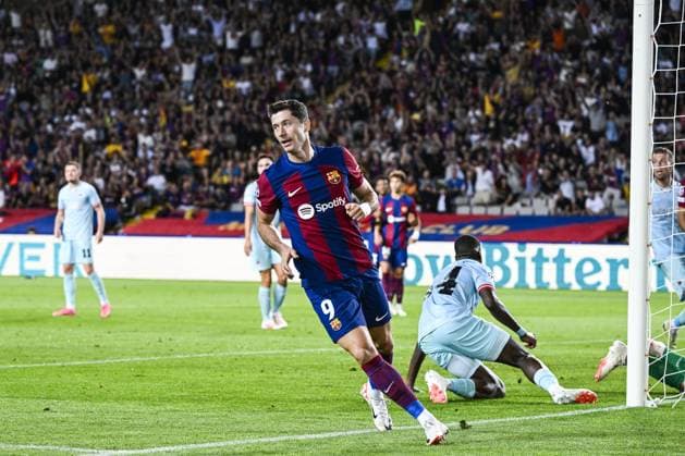 Barcelona s Robert Lewandowski celebrates after scoring during a soccer game between Spanish FC Barcelona, Barca and Belgian Royal Antwerp FC, on Tuesday 19 September 2023 in Barcelona, Spain, on day 1 of the Champions League group stage, in group H. TOM GOYVAERTS TomxGoyvaerts  x74451622x