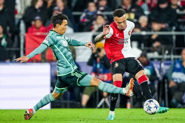 UEFA Champions League: Feyenoord v Celtic Rotterdam - Hyunjun Yang of Celtic, Quilindschy Hartman of Feyenoord during the 1st leg of the UEFA Champions League between Feyenoord v Celtic at Stadion Feijenoord De Kuip on 19 September 2023 in Rotterdam, The Netherlands. Copyright: xTomxBodex