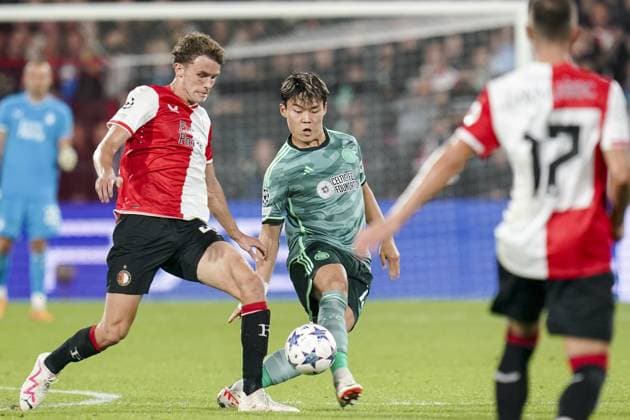 ROTTERDAM, 19Ã09-2023, Stadium Feijenoord De Kuip , Champions League , season 2023 2024, Feyenoord - Celtic , Feyenoord player Mats Wieffer and Celtic player Hyeongyu Oh Feyenoord - Celtic  x22412796x Copyright: