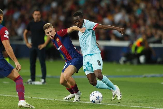 (L-R) Fermin Lopez (Barcelona), Alhassan Yusuf (Antwerp), SEPTEMBER 19, 2023 - Football Soccer : UEFA Champions League Group stage Group H match between FC Barcelona, Barca 5-0 Royal Antwerp FC at the Estadi Olimpic Lluis Companys in Barcelona, Spain. Noxthirdxpartyxsales  (229813681)