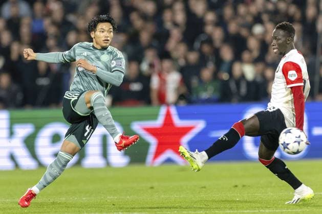 Football: UEFA Champions League Celtic s Reo Hatate (L) plays in a UEFA Champions League group stage football match against Feyenoord on Sept. 19, 2023, in Rotterdam, the Netherlands.  A14AA0001897447P