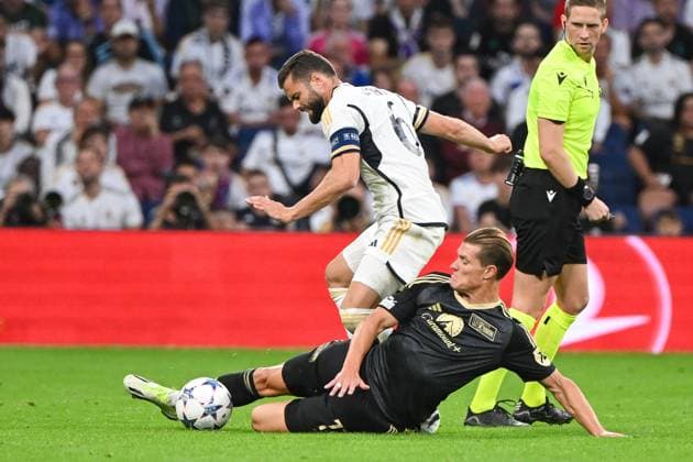Fussball, Herren, Saison 2023 2024, Champions League (Gruppe C, 1. Spieltag), Real Madrid - 1. FC Union Berlin, v. l. Nacho (Real Madrid) und Kevin Behrens (1. FC Union Berlin) im Zweikampf, battle for the ball, 20.09. 2023, Copyright: xMatthiasxKochx