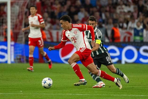 Jamal Musiala (FC Bayern Muenchen) und Bruno Fernandes Manchester United, ManU . Deutschland, Muenchen, 20.09.2023, Fussball, UEFA Champions League: FC Bayern Muenchen vs Manchester United, Saison 2023 2024, Match Day 1, Allianz Arena Foto: A2 Bildagentur Peter Hartenfelser