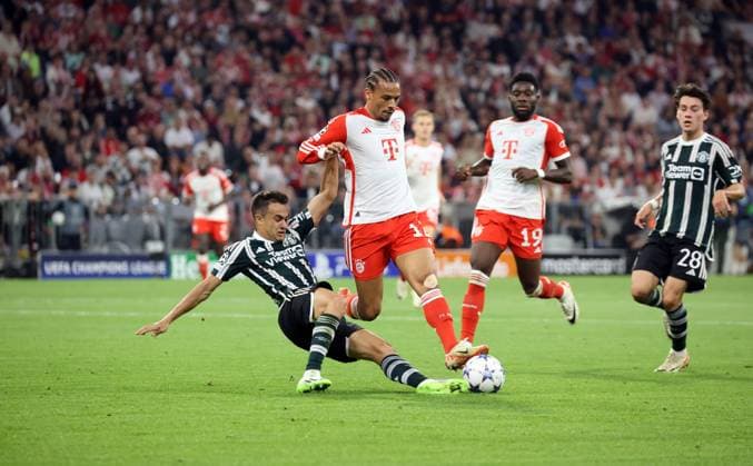 20.09.23 FC Bayern München - Manchester United, ManU Deutschland, München 20.09.2023, Fussball, Champions League, FC Bayern München - Manchester United: v.l. Sergio Reguilon (Manchester United), Leroy Sane (FC Bayern München).