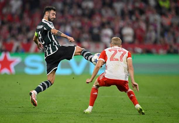 Zweikampf Hackentrick Bruno Fernandes Manchester United, ManU ManU (08) gegen Konrad Laimer FC Bayern Muenchen FCB (27) FC Bayern Muenchen FCB vs Manchester United ManUnited ManU Gruppenphase 20.09.2023 DFL REGULATIONS PROHIBIT ANY USE OF PHOTOGRAPHS AS IMAGE SEQUENCES AND OR QUASI-VIDEO FC Bayern Muenchen FCB vs Manchester United