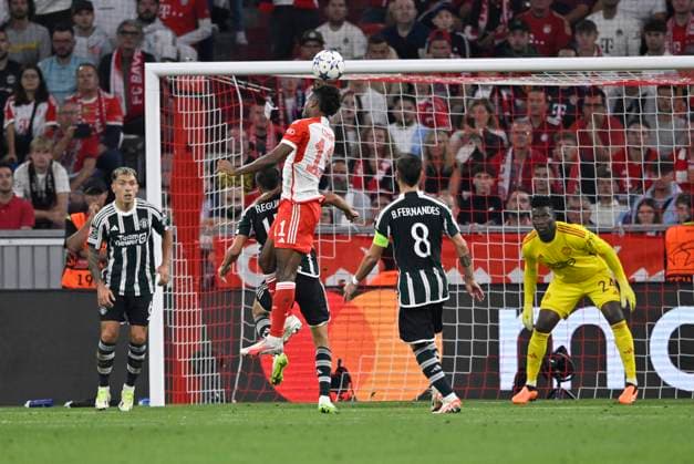 Strafraumszene, Torraumszene Kingsley Coman FC Bayern Muenchen FCB (11) Kopfball Torschuss Aktion Torchance gegen Torwart Andre Onana Manchester United, ManU ManU (24) FC Bayern Muenchen FCB vs Manchester United ManUnited ManU Gruppenphase 20.09.2023 DFL REGULATIONS PROHIBIT ANY USE OF PHOTOGRAPHS AS IMAGE SEQUENCES AND OR QUASI-VIDEO FC Bayern Muenchen FCB vs Manchester United