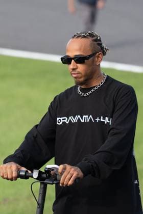 September 21, 2023, Suzuka, Mie Prefecture, Japan: LEWIS HAMILTON (GBR) of Mercedes 44 arrives to Turn 2 for a meeting called by Sebastian Vettel...A Buzzin Corner bee hive bee hotel constructed as an initiative by former F1 World Champion Sebastian Vettel during Preparation Day of the Formula 1 Lenovo Japanese Grand Prix. Vettel called a meeting of all the 20 starting grid drivers at Turn 2 to personalize the bee hotels and draw media attention to environmental conservation efforts. Suzuka Japan - ZUMAb177 20230921_aap_b177_111 Copyright: xTaidghxBarronx