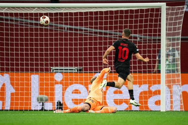 230921 Florian Wirtz of Bayer Leverkusen scores 1-0 behind goalkeeper Peter Abrahamsson of Häcken during the UEFA Europa League football match between Bayer Leverkusen and Häcken on September 21, 2023 in Leverkusen. Photo: Daniel Stiller BILDBYRAN kod DS DS0334 fotboll football soccer fotball uefa europa league bayer leverkusen häcken bbeng Copyright: DANIELxSTILLER BB230921DS016
