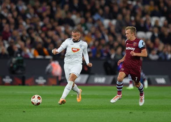 21st September 2023; London Stadium, London, England; Europa League Football, Group Stage, West Ham United versus Backa Topola; Ifet Dakovac of FK TSC Backa Topola passing the ball into midfield closely marked by James Ward-Prowse of West Ham United  ActionPlus12555715 JohnxPatrickxFletcher