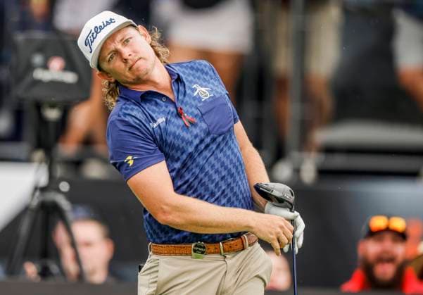 Cam Smith of Australia watches his tee shot on the eighteenth hole during the first round of the 2023 LIV Golf League tournament at Rich Harvest Farms in Sugar Grove, Illinois, on Friday September 22, 2023. Tournament play runs from September 22nd through the 24th.  SGI20230922813 TANNENxMAURY