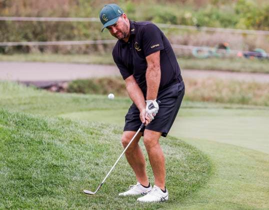 Graeme McDowell of Northern Ireland chips onto the fifteenth green during the first round of the 2023 LIV Golf League tournament at Rich Harvest Farms in Sugar Grove, Illinois, on Friday September 22, 2023. Tournament play runs from September 22nd through the 24th.  SGI20230922827 TANNENxMAURY
