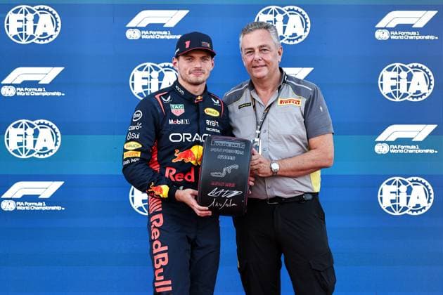 (230923) -- SUZUKA, Sept. 23, 2023 -- Red Bull Racing s Dutch driver Max Verstappen (L) poses after taking the pole position after the qualifying session of the Formula One Japanese Grand Prix held at the Suzuka Circuit in Suzuka City, Japan, on Sept. 23, 2023. (Photo by Xinhua) (SP)JAPAN-SUZUKA-F1-JAPAN GRAND PRIX-QUALIFYING SESSION QianxJun 