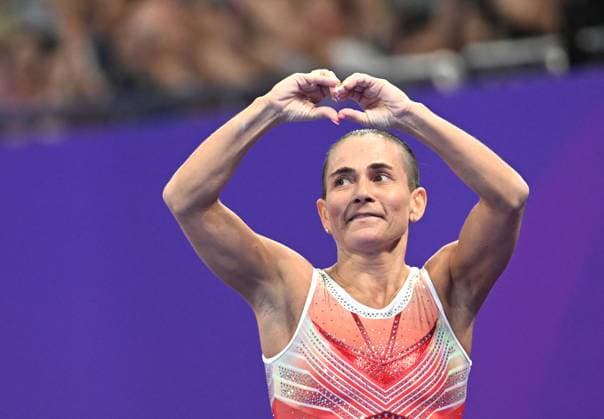 Sport Themen der Woche KW39 Sport Bilder des Tages (230926) -- HANGZHOU, Sept. 26, 2023 -- Oksana Chusovitina of Uzbekistan acknowledges the spectators after competing in the Vault of Artistic Gymnastics Women s Qualifications and Team Finals at the 19th Asian Games in Hangzhou, east China s Zhejiang Province, Sept. 25, 2023. ) (SP)CHINA-HANGZHOU-ASIAN GAMES-ARTISTIC GYMNASTICS(CN) ChengxMin 