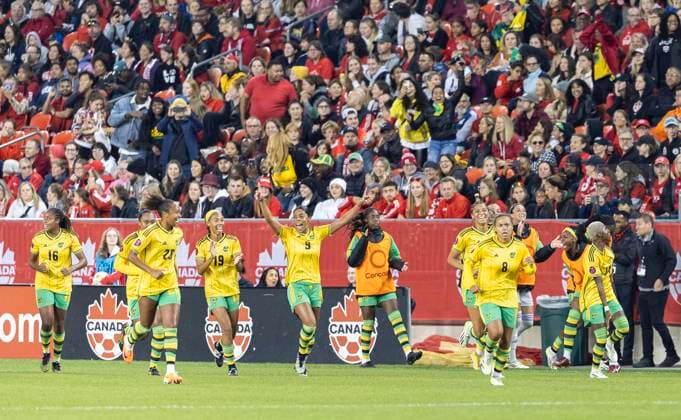 (230927) -- TORONTO, Sept. 27, 2023 -- Players of Jamaica celebrate after scoring during the Play-In series second leg match of the CONCACAF Women s Olympic Qualifying between Canada and Jamaica at BMO Field in Toronto, Canada, on Sept. 26, 2023. Canada women s national soccer team advanced to the Paris 2024 Olympic Games, Olympische Spiele, Olympia, OS on Tuesday. (Photo by Xinhua) (SP)CANADA-TORONTO-SOCCER-CONCACAF WOMEN S OLYMPIC QUALIFYING-PLAY-IN SERIES ZouxZheng 