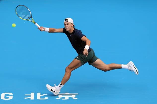 (230929) -- BEIJING, Sept. 29, 2023 -- Denmark s Holger Rune hits a return to Canada s Felix Auger-Aliassime during the men s singles first round match at 2023 China Open tennis tournament in Beijing, capital of China, Sept. 29, 2023. ) (SP)CHINA-BEIJING-TENNIS-CHINA OPEN-MEN S SINGLES-1ST ROUND(CN) LuoxYuan 