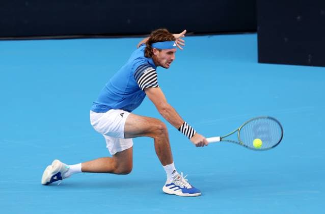(230929) -- BEIJING, Sept. 29, 2023 -- Greece s Stefanos Tsitsipas hits a return to Chile s Nicolas Jarry during the men s singles first round match at 2023 China Open tennis tournament in Beijing, capital of China, Sept. 29, 2023. ) (SP)CHINA-BEIJING-TENNIS-CHINA OPEN-MEN S SINGLES-1ST ROUND(CN) LuoxYuan 