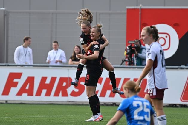Jubel, Freuen, celebrate, happy, cheer , Goal Celebration Janou Levels (B04 , 5) mit Torschützin Nikola Karczewska (B04, 9), 30.09.2023, Leverkusen (Deutschland), Fussball,google Pixel Frauenbundesliga - bayer 04 Leverkusen - 1.FC Nürnberg, DFB DFL REGULATIONS PROHIBIT ANY USE OF PHOTOGRAPHS AS IMAGE SEQUENCES AND OR QUASI-VIDEO.