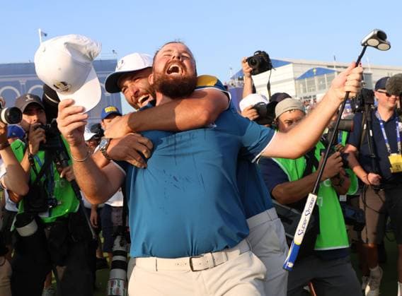 Team Europe s Shane Lowry celebrates his team winning the Ryder Cup beating Team USA by fourteen and a half points to ten points on the final day of the Ryder Cup at Marco Simone Golf Club, Rome, Italy on Sunday, October 01, 2023.  LON2023100107 HUGOxPHILPOTT