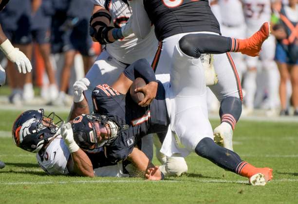 Sport Themen der Woche KW39 Sport Bilder des Tages Chicago Bears quarterback Justin Fields (1) is sacked by Denver Broncos linebacker Jonathon Cooper (0) at Soldier Field in Chicago on Sunday, October 1, 2023. Broncos won 31-28.  CHI20231001132 MARKxBLACK