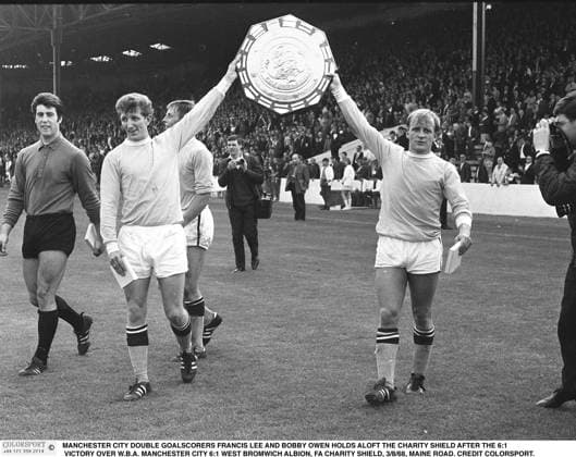 MANCHESTER CITY DOUBLE GOALSCORERS FRANCIS LEE AND BOBBY OWEN HOLDS ALOFT THE CHARITY SHIELD AFTER THE VICTORY OVER W.B.A. (goalkeeper, Ken Mulhearn left) MANCHESTER CITY v WEST BROMWICH ALBION, FA CHARITY SHIELD, 03 08 1968, MAINE ROAD. Football 
