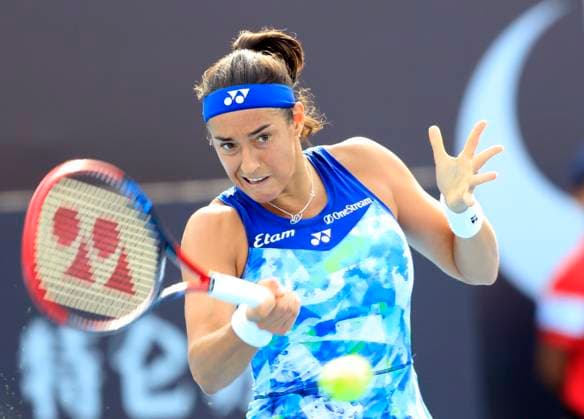 (231003) -- BEIJING, Oct. 3, 2023 -- France s Caroline Garcia hits a return to Kazakhstan s Yulia Putintseva during the women s singles second round match at 2023 China Open tennis tournament in Beijing, capital of China, Oct. 3, 2023. ) (SP)CHINA-BEIJING-TENNIS-CHINA OPEN-WOMEN S SINGLES-2ND ROUND (CN) LuoxYuan 