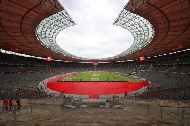 03.10.2023, xtgx, Fussball, UEFA Champions League, 1.FC Union Berlin - Sporting Braga emspor, v.l. Symbolfoto, Symbolbild, Champions League im Olympiastadion, Union Berlin, das Stadion wurde in den Vereinsfarben umgewandelt (DFL DFB REGULATIONS PROHIBIT ANY USE OF PHOTOGRAPHS as IMAGE SEQUENCES and or QUASI-VIDEO) Olympiastadion