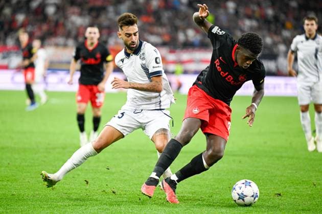 SOCCER - UEFA CL, RBS vs Sociedad iSALZBURG,AUSTRIA,03.OCT.23 - SOCCER - UEFA Champions League, group stage, Red Bull Salzburg vs Real Sociedad. Image shows Brais Mendez(Sociedad) and Lucas Gourna Douath (Salzburg).  GEPAxpictures xDanielxSchoenherr