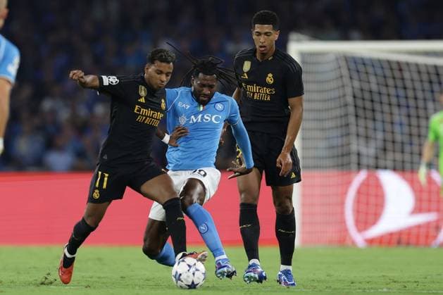 Italy: Serie a football match SSC Napoli vs Real Madrid Real Madrid s Brazilian forward Rodrygo challenges for the ball with SSC Napoli s Cameroonian midfielder Andre Zambo Anguissa during the Uefa champions league match between SSC Napoli vs Real Madrid at the Diego Armando Maradona Stadium in Naples, southern Italy, on October 03, 2023. ABPH1633 Copyright: xAntonioxBalascox