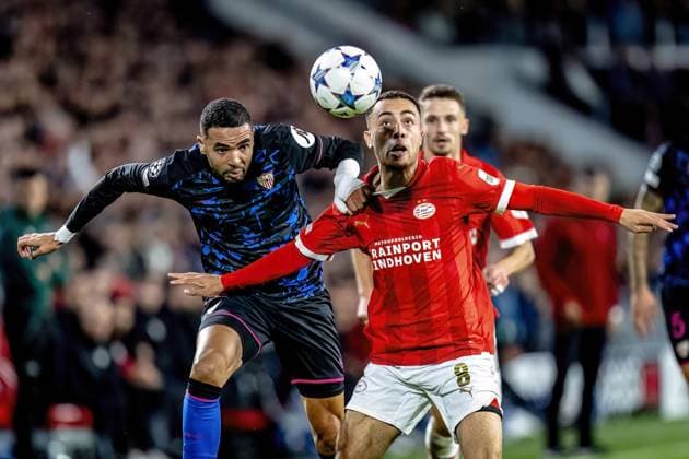EINDHOVEN, Netherlands, 03-10-2023, SPO, Philips stadium, Champions League, season 2023 2024, Sevilla FC player Youssef En-Nesyri, PSV player Sergino Dest during the match PSV - Sevilla, Netherlands, Eindhoven on 3 oktober 2023 PSV - Sevilla x22612846x Copyright: