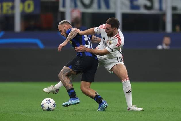 Milan, Italy, 3rd October 2023. Orkun Kokcu of SL Benfica clashes with Federico Dimarco of FC Internazionale during the UEFA Champions League match at Giuseppe Meazza, Milan. Picture credit should read: Jonathan Moscrop Sportimage EDITORIAL USE ONLY. No use with unauthorised audio, video, data, fixture lists, club league logos or live services. Online in-match use limited to 120 images, no video emulation. No use in betting, games or single club league player publications. SPI-2603-0017